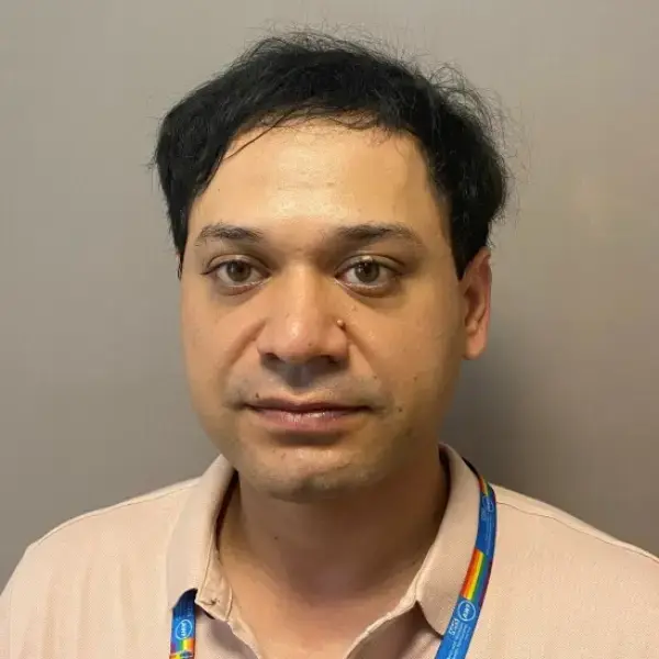 Dr Asher Naik